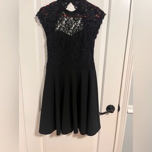 Jun and Ivy Large Black Dress with an open back